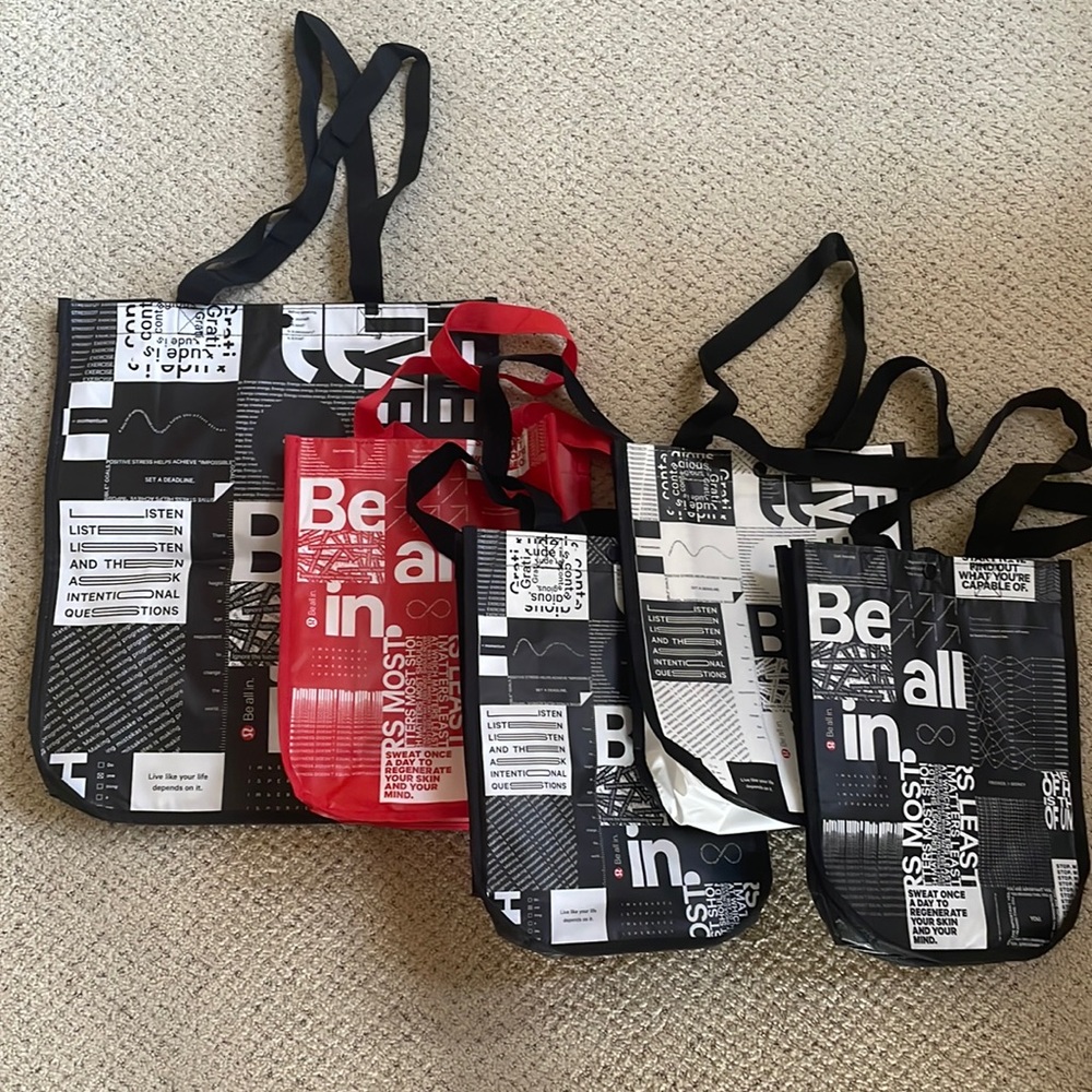 Lot of five lulu-lemon reusable shopping bags